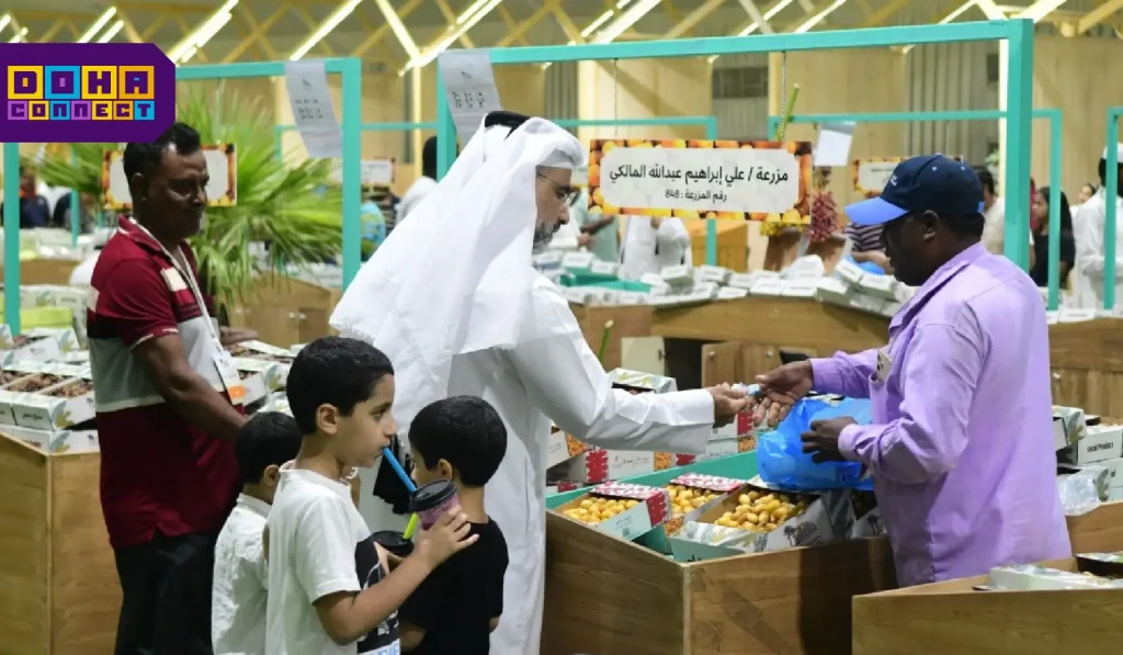 Crowds exploring stalls filled with fresh dates at the 10th Local Date Festival in Souq Waqif, Qatar, with families enjoying the lively atmosphere.